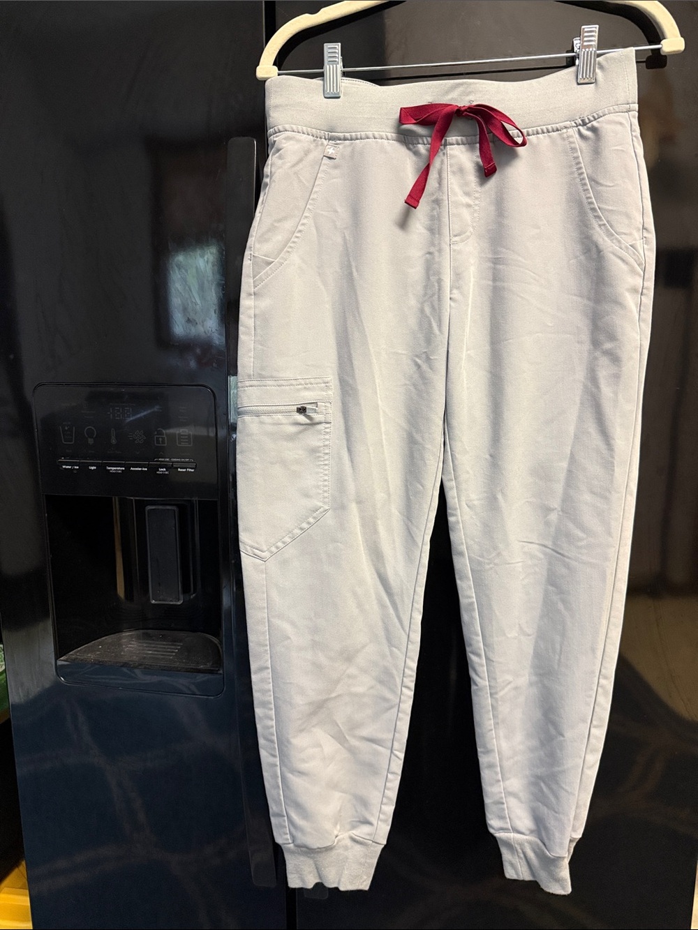 FIGS Women’s Technical Collection Joggers in Grey with Maroon tie